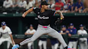 Sep 20, 2025; Arlington, Texas, USA; Miami Marlins pitcher Ronny Henriquez (32) throws to the plate during the seventh inning against the Texas Rangers at Globe Life Field. 