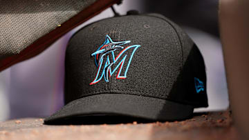 Apr 11, 2019; Cincinnati, OH, USA; A view of a New Era Miami Marlins hat in the dugout during the game against the Cincinnati Reds at Great American Ball Park. Mandatory Credit: Aaron Doster-Imagn Images