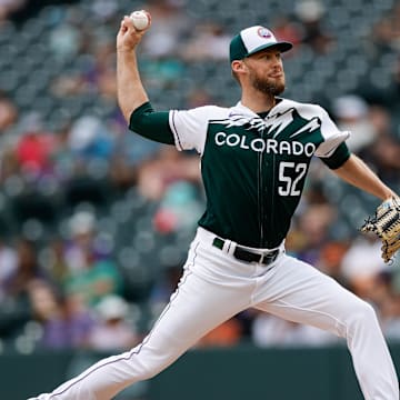 Colorado Rockies relief pitcher Daniel Bard (52) pitches in the ninth inning against the San Diego Padres at Coors Field in 2023. 