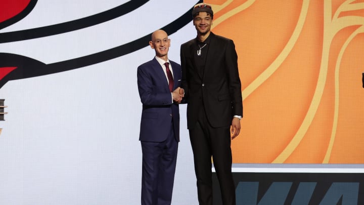 Jun 26, 2024; Brooklyn, NY, USA; Kel'el Ware poses for photos with NBA commissioner Adam Silver after being selected in the first round by the Miami Heat in the 2024 NBA Draft at Barclays Center. Mandatory Credit: Brad Penner-USA TODAY Sports