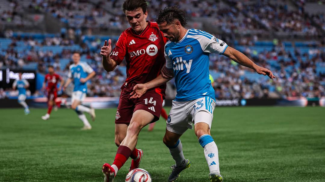 TFC's Alonso Coello challenges Charlotte's Brandt Bronico for the ball. Charlotte was victorious 3-1.