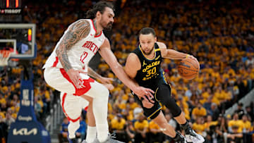 May 2, 2025; San Francisco, California, USA; Golden State Warriors guard Stephen Curry (30) dribbles past Houston Rockets center Steven Adams (12) in the third quarter of game six of the first round for the 2025 NBA Playoffs at Chase Center. Mandatory Credit: Cary Edmondson-Imagn Images
