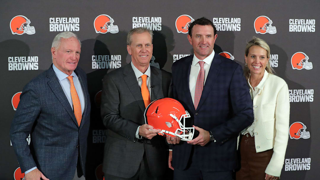 New Cleveland Browns head coach Todd Monken, center, poses with members of the ownership group, from left, Jimmy Haslam, JW Johnson and Whitney Haslam-Johnson during Monken’s introductory press conference at the team's training facility, Feb. 3, 2026.