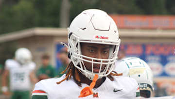 Mandarin cornerback Brody Jennings (3) runs through pregame warm-ups before a high school spring football game at Bolles on May 22, 2025. [Clayton Freeman/Florida Times-Union]