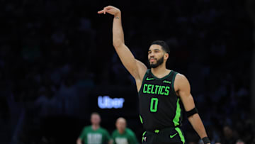 Feb 10, 2025; Miami, Florida, USA; Boston Celtics forward Jayson Tatum (0) reacts after scoring against the Miami Heat during the third quarter at Kaseya Center. Mandatory Credit: Sam Navarro-Imagn Images