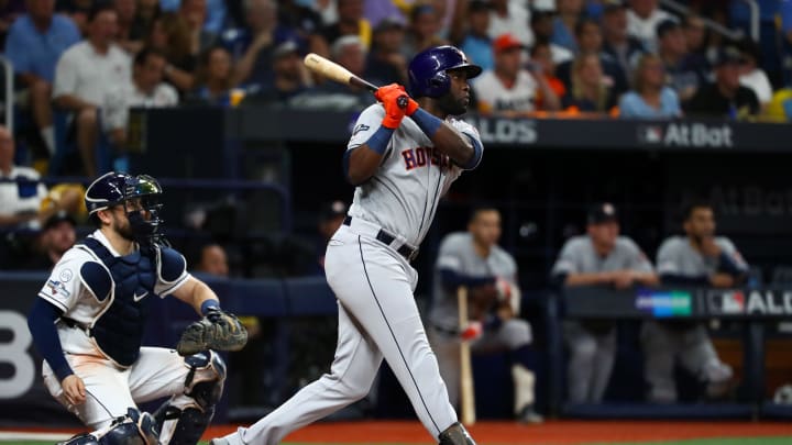 Oct 8, 2019; St. Petersburg, FL, USA; Houston Astros designated hitter Yordan Alvarez (44) doubles during the fourth inning in game four of the 2019 ALDS playoff baseball series against the Tampa Bay Rays at Tropicana Field.