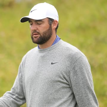 Scottie Scheffler reacts after missing a putt on the 14th hole during the first round of the British Open on Thursday.