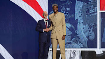 Jun 26, 2024; Brooklyn, NY, USA; Alexander Sarr poses for photos with NBA commissioner Adam Silver after being selected in the first round by the Washington Wizards in the 2024 NBA Draft at Barclays Center. Mandatory Credit: Brad Penner-Imagn Images