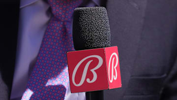 Sep 1, 2024; San Francisco, California, USA; Miami Marlins in-game reporter Craig Minervini holds a microphone with a Bally sports mic flag before the game against the San Francisco Giants at Oracle Park. 
