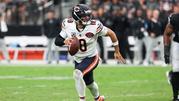 Chicago Bears quarterback Caleb Williams runs out of the pocket during the second half against Las Vegas Raiders