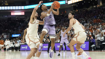 Feb 19, 2024; Austin, Texas, USA; Kansas State Wildcats guard Tylor Perry (2) drives to the basket against Texas.