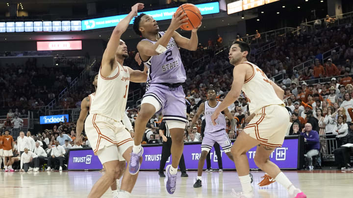 Feb 19, 2024; Austin, Texas, USA; Kansas State Wildcats guard Tylor Perry (2) drives to the basket against Texas.