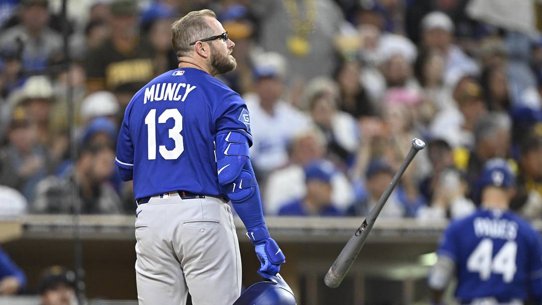 May 18, 2026; San Diego, California, USA; Los Angeles Dodgers third baseman Max Muncy (13) tosses his bat after striking out during the fifth inning against the San Diego Padres at Petco Park. Mandatory Credit: Denis Poroy-Imagn Images