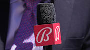 Sep 1, 2024; San Francisco, California, USA; Miami Marlins in-game reporter Craig Minervini holds a microphone with a Bally sports mic flag before the game against the San Francisco Giants at Oracle Park. 