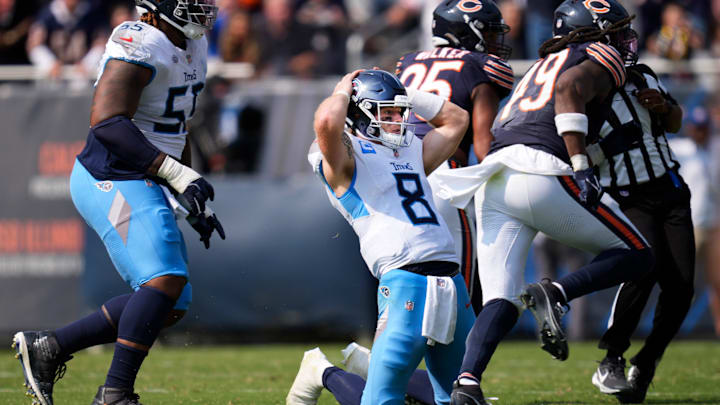 Tennessee Titans quarterback Will Levis (8) reacts to an interception that was returned for a Chicago Bears touchdown during the fourth quarter at Soldier Field in Chicago, Ill., Sunday, Sept. 8, 2024.