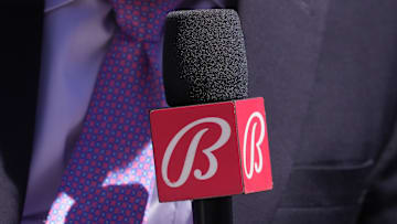 Sep 1, 2024; San Francisco, California, USA; Miami Marlins in-game reporter Craig Minervini holds a microphone with a Bally sports mic flag before the game against the San Francisco Giants at Oracle Park. 