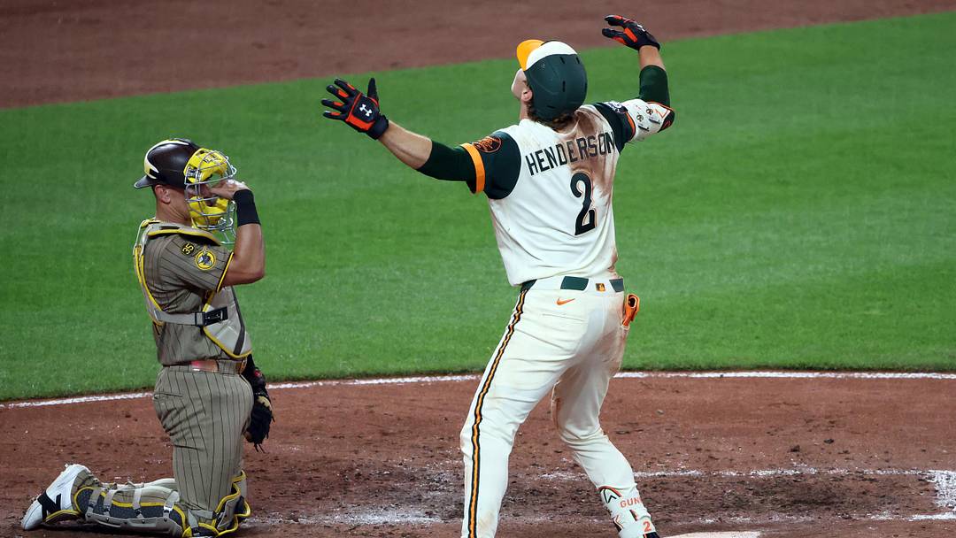 Jun 12, 2026; Baltimore, Maryland, USA; Baltimore Orioles shortstop Gunnar Henderson (2) celebrates after hitting his 100th career home run during the fourth inning against the San Diego Padres at Oriole Park at Camden Yards. Mandatory Credit: Daniel Kucin Jr.-Imagn Images