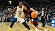 Mar 13, 2024; Las Vegas, NV, USA; Stanford Cardinal guard Benny Gealer (15) dribbles against California Golden Bears guard Jalen Celestine (32) during the second half at T-Mobile Arena. Mandatory Credit: Stephen R. Sylvanie-Imagn Images