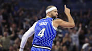 Dec 5, 2025; Orlando, Florida, USA; Orlando Magic guard Jalen Suggs (4) reacts after a basket against the Miami Heat in the third quarter at Kia Center. Mandatory Credit: Nathan Ray Seebeck-Imagn Images