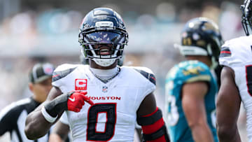 Sep 21, 2025; Jacksonville, Florida, USA; Houston Texans linebacker Azeez Al-Shaair (0) celebrates a play in the second quarter against the Jacksonville Jaguars at EverBank Stadium. 