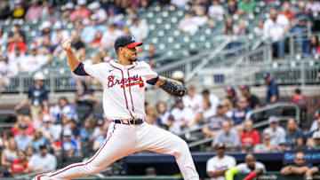 Sep 29, 2024; Cumberland, Georgia, USA; Atlanta Braves pitcher Charlie Morton (50) pitches the ball against the Kansas City Royals during the first inning at Truist Park. 