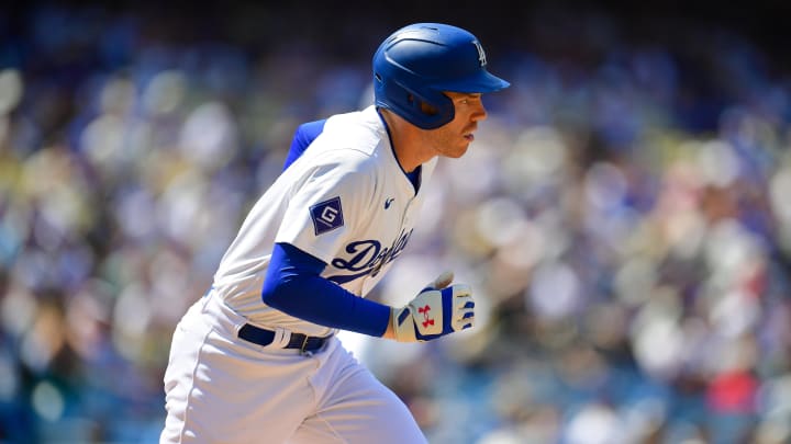 Los Angeles Dodgers first baseman Freddie Freeman (5) runs after hitting a single against the San Francisco Giants during the sixth inning at Dodger Stadium.