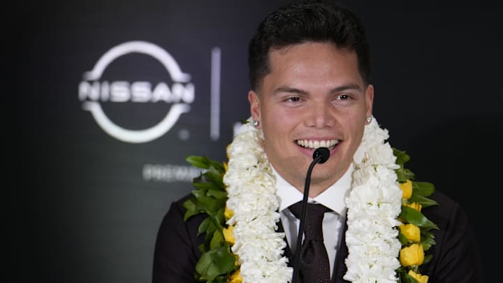 Dec 14, 2024; New York, NY, USA; Oregon Ducks quarterback Dillon Gabriel speaks on stage during a press conference before the 2024 Heisman Trophy Presentation. Dec 14, 2024; New York, NY, USA; Oregon Ducks quarterback Dillon Gabriel speaks on stage during a press conference before the 2024 Heisman Trophy Presentation.