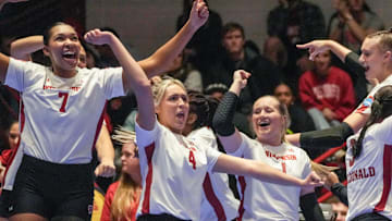 Wisconsin Badgers players cheer after their teammates score during their first set against Penn State in the 2022 NCAA volleyball tournament Sweet 16 women's volleyball match Thursday, Dec. 8, 2022, at UW Field House in Madison, Wis.