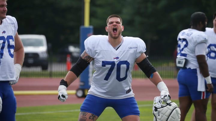 Bills offensive lineman Alec Anderson gives a loud roar towards the sidelines as the unit warms up during day six of the Buffalo Bills training camp at St. John Fisher University in Pittsford, Tuesday, July 30, 2024.