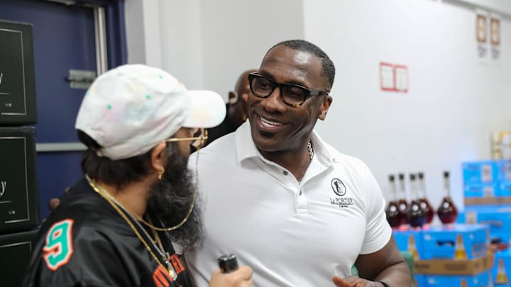NFL Hall of Famer and former SSU football player Shannon Sharpe talks to a fan from Hinesville, Ga after signing a bottle of his Le Portier Shay VSOP Luxury Cognac at Habersham Beverage Warehouse in Savannah on Thursday, March 19, 2025. NFL Hall of Famer and former SSU football player Shannon Sharpe talks to a fan from Hinesville, Ga after signing a bottle of his Le Portier Shay VSOP Luxury Cognac at Habersham Beverage Warehouse in Savannah on Thursday, March 19, 2025.