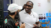 NFL Hall of Famer and former SSU football player Shannon Sharpe talks to a fan from Hinesville, Ga after signing a bottle of his Le Portier Shay VSOP Luxury Cognac at Habersham Beverage Warehouse in Savannah on Thursday, March 19, 2025.