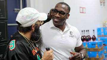 NFL Hall of Famer and former SSU football player Shannon Sharpe talks to a fan from Hinesville, Ga after signing a bottle of his Le Portier Shay VSOP Luxury Cognac at Habersham Beverage Warehouse in Savannah on Thursday, March 19, 2025.