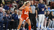 Miami Hurricanes guard Haley Cavinder (14) looks for an open teammate against the Villanova Wildcats during the NCAA Women   s Tournament at Bon Secours Wellness Arena. 