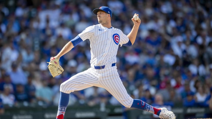 Aug 17, 2024; Chicago, Illinois, USA; Chicago Cubs relief pitcher Drew Smyly (11) pitches during the seventh inning against the Toronto Blue Jays at Wrigley Field.