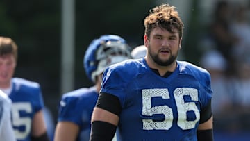 Indianapolis Colts guard Quenton Nelson (56) walks onto the field during the first day of the Indianapolis Colts’ training camp Thursday, July 25, 2024, at Grand Park Sports Complex in Westfield.