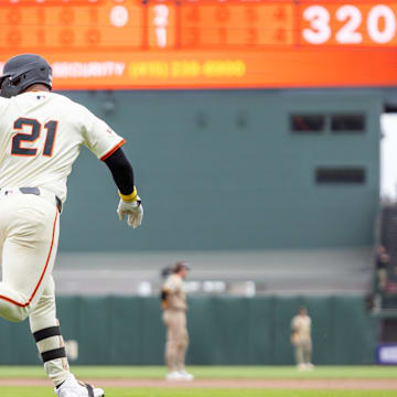 San Francisco Giants outfielder Heliot Ramos (21) hits a solo home run during the ninth inning against the San Diego Padres at Oracle Park on Sept 15.