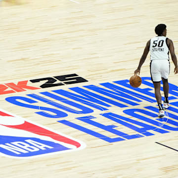 Jul 22, 2024; Las Vegas, NV, USA; Miami Heat guard Isaiah Stevens (50) dribbles the ball against the Memphis Grizzlies during the second half at Thomas & Mack Center. Mandatory Credit: Lucas Peltier-Imagn Images