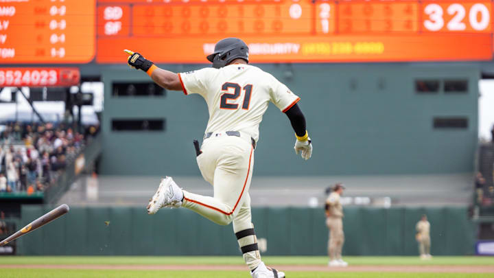 San Francisco Giants outfielder Heliot Ramos (21) hits a solo home run during the ninth inning against the San Diego Padres at Oracle Park on Sept 15.