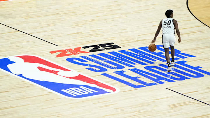 Jul 22, 2024; Las Vegas, NV, USA; Miami Heat guard Isaiah Stevens (50) dribbles the ball against the Memphis Grizzlies during the second half at Thomas & Mack Center. Mandatory Credit: Lucas Peltier-Imagn Images Jul 22, 2024; Las Vegas, NV, USA; Miami Heat guard Isaiah Stevens (50) dribbles the ball against the Memphis Grizzlies during the second half at Thomas & Mack Center. Mandatory Credit: Lucas Peltier-Imagn Images