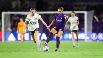 May 11, 2024; Orlando, Florida, USA; Orlando Pride midfielder Ally Lemos (30) battles for the ball against Bay FC midfielder Joelle Anderson (18) during the second half at Inter&Co Stadium. Mandatory Credit: Nathan Ray Seebeck-USA TODAY Sports