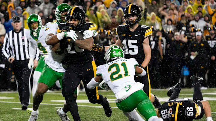 Iowa Hawkeyes running back Kamari Moulton (28) carries the ball Nov. 8, 2025 during a Big Ten Football game against the Oregon Ducks at Kinnick Stadium in Iowa City, Iowa.
