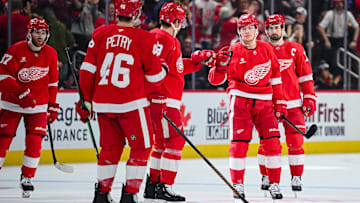 Dec 18, 2024; Detroit, Michigan, USA; Detroit Red Wings right wing Patrick Kane (88) celebrates with teammates after scoring the game winning goal during the third period against the Philadelphia Flyers at Little Caesars Arena. Mandatory Credit: Tim Fuller-Imagn Images