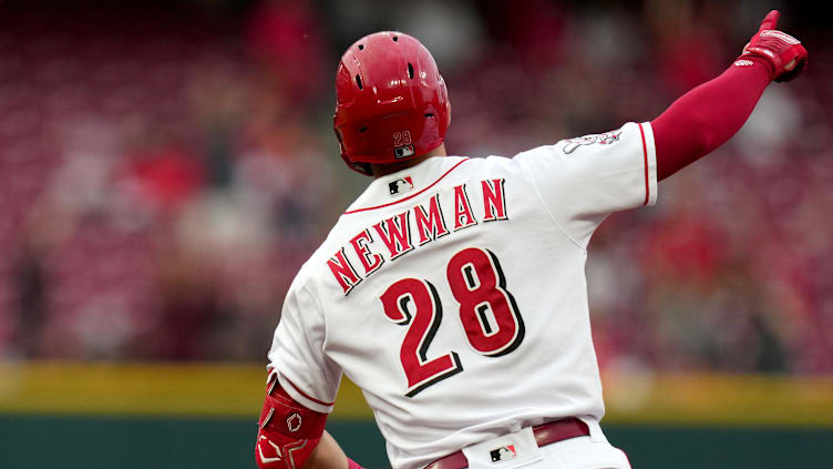 Cincinnati Reds shortstop Kevin Newman (28) rounds the bases after hitting a solo home run in the