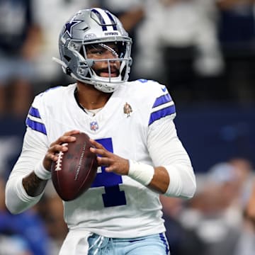 Sep 15, 2024; Arlington, Texas, USA; Dallas Cowboys quarterback Dak Prescott (4) warms up before a game against the New Orleans Saints at AT&T Stadium. 