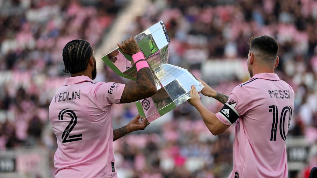 Inter Miami's DeAndre Yedlin and Lionel Messi lift the 2023 Leagues Cup after winning an epic showdown against Nashville SC.