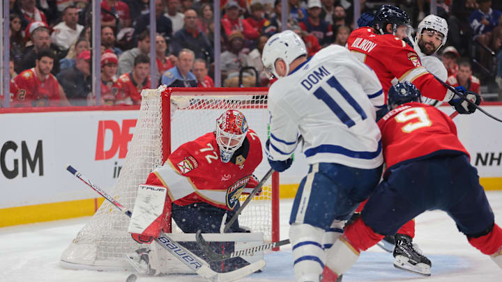 May 9, 2025; Sunrise, Florida, USA; Florida Panthers goaltender Sergei Bobrovsky (72) makes a save against Toronto Maple Leafs center Max Domi (11) during the third period in game three of the second round of the 2025 Stanley Cup Playoffs at Amerant Bank Arena. Mandatory Credit: Sam Navarro-Imagn Images