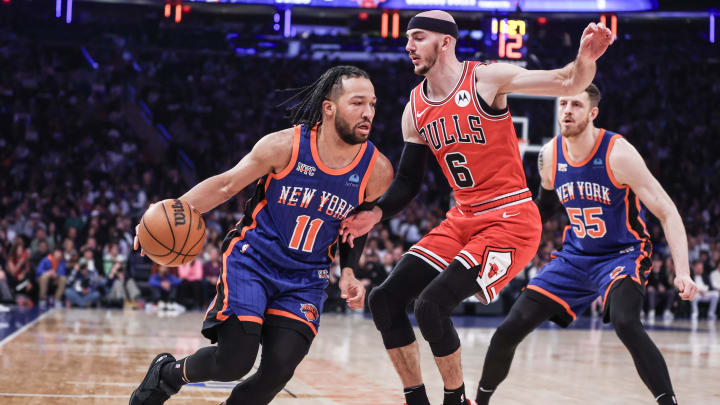 Apr 14, 2024; New York, New York, USA;  New York Knicks guard Jalen Brunson (11) drives past  Chicago Bulls guard Alex Caruso (6) in the first quarter at Madison Square Garden. Mandatory Credit: Wendell Cruz-USA TODAY Sports