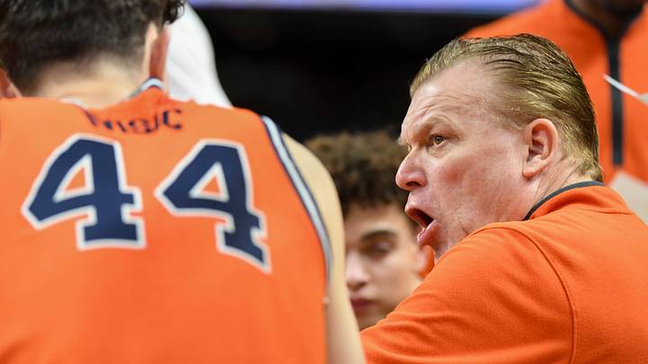 Illinois Fighting Illini head coach Brad Underwood leads a team huddle Saturday, March 21, 2026, during the NCAA Men’s Basketball Tournament second round game against the VCU Rams at Bon Secours Wellness Arena in Greenville, South Carolina.