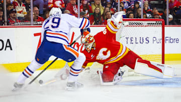 Edmonton Oilers center Leon Draisaitl (29) controls the puck against Calgary Flames goaltender Dan Vladar (80)