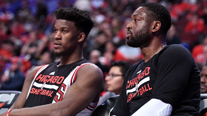 Apr 12, 2017; Chicago, IL, USA; Chicago Bulls guard Dwyane Wade (3) and forward Jimmy Butler (21) rest during the second half against the Brooklyn Nets at the United Center. Chicago defeats Brooklyn 112-73. Mandatory Credit: Mike DiNovo-Imagn Images